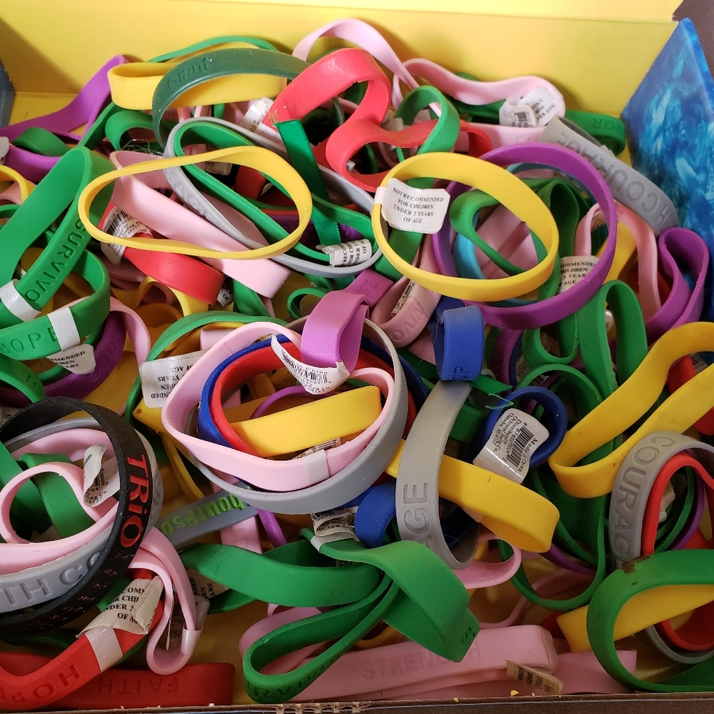 Large Lot of NWT Rubber Cause Bracelets